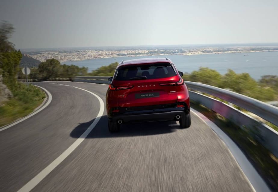 2026 Mazda CX-5 driving on a winding road
