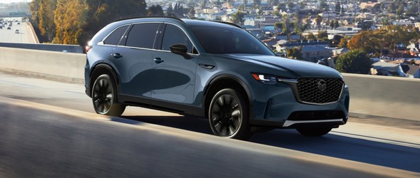 2026 Mazda CX-90 Inline 6 driving on a city road