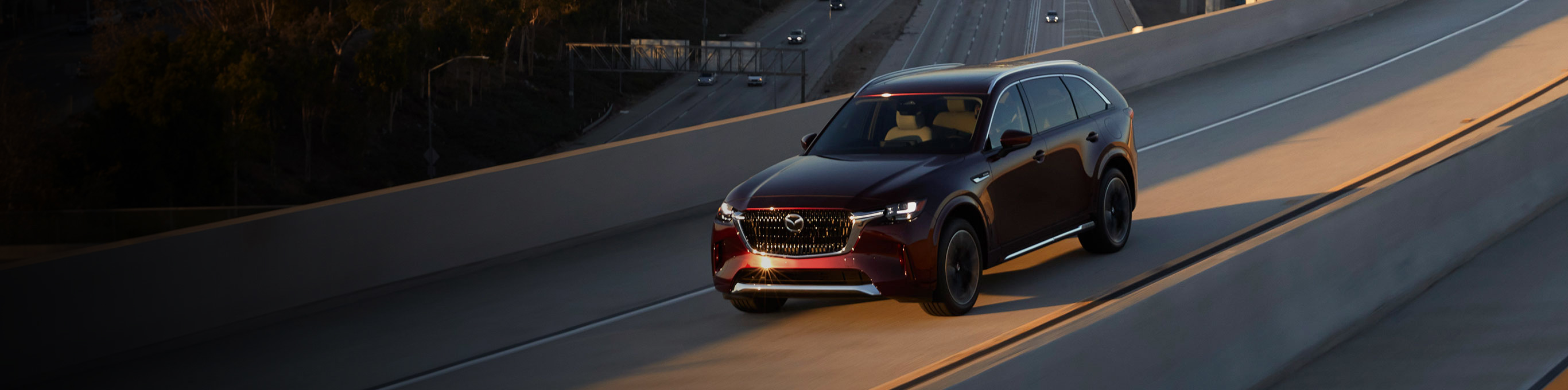 2026 Mazda CX-90 driving on a road