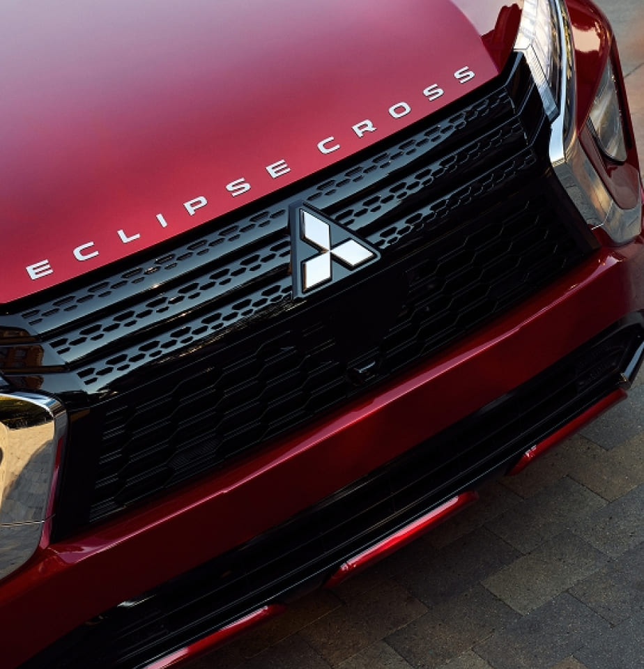 Eclipse Cross badge and Mitsubishi emblem on the front grille